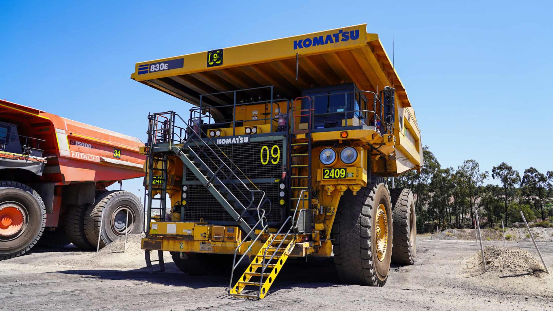Heavy-duty construction vehicle at a worksite, designed for earthmoving and excavation tasks, showcasing industrial equipment safety and operational efficiency.