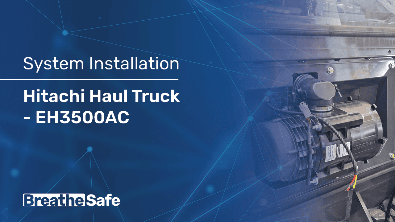 Image of a Hitachi haul truck system installation with detailed machinery components, showcasing BreatheSafe's expertise in industrial ventilation solutions for heavy equipment.