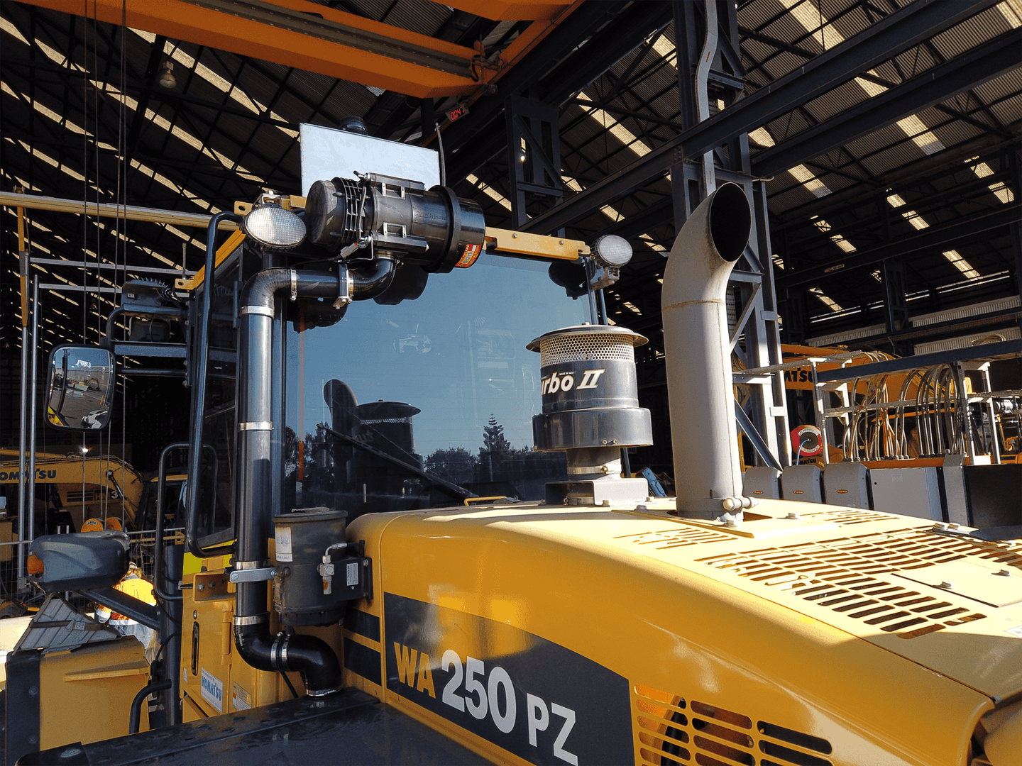 Komatsu WA250PZ-6 with cabin filtration and pressurisation system