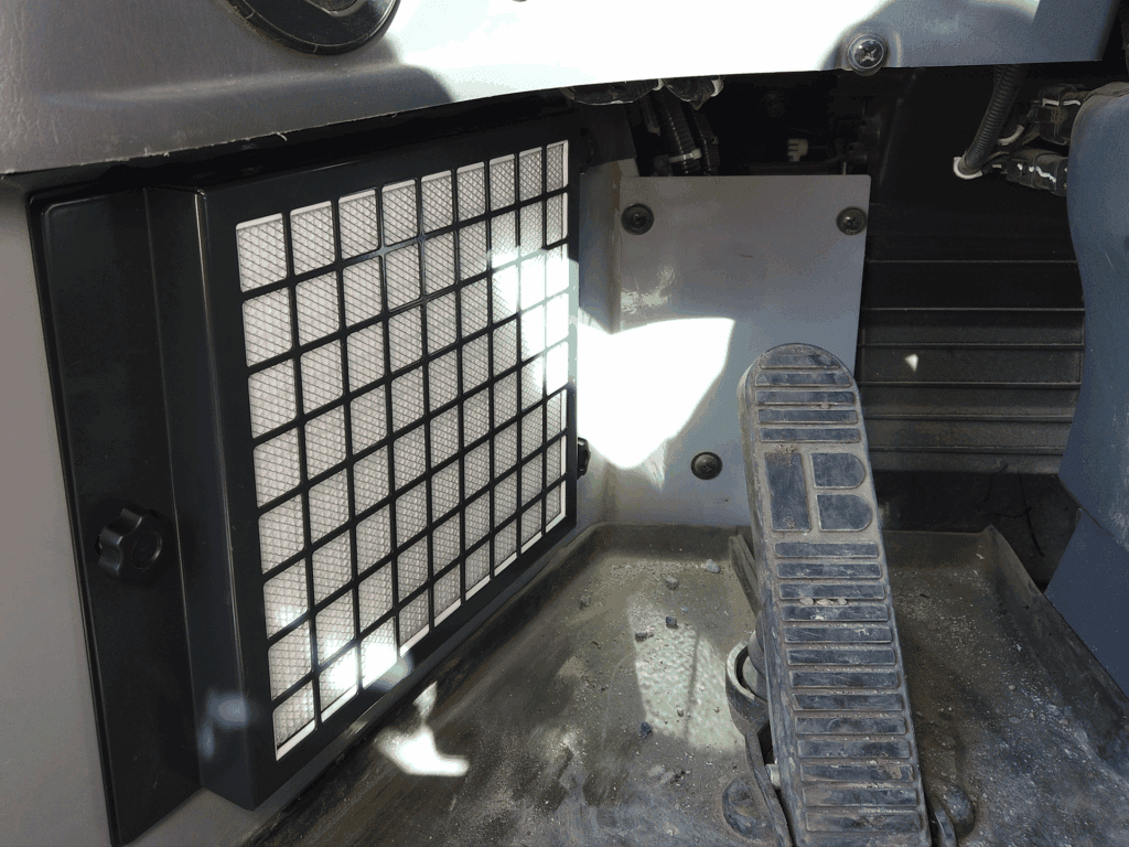 BreatheSafe Air filtration unit installed inside a vehicle for improved air quality and safety.