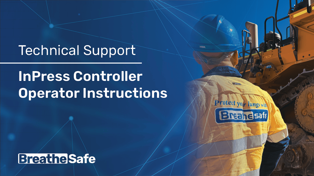 Image of a worker in safety gear with a BreatheSafe vest, operating heavy machinery with technical support overlay, emphasizing respiratory safety in industrial environments.